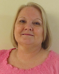 Iris Mills, Administrator
