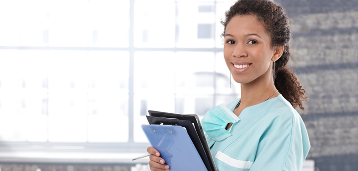 nurse holding a patient's chart