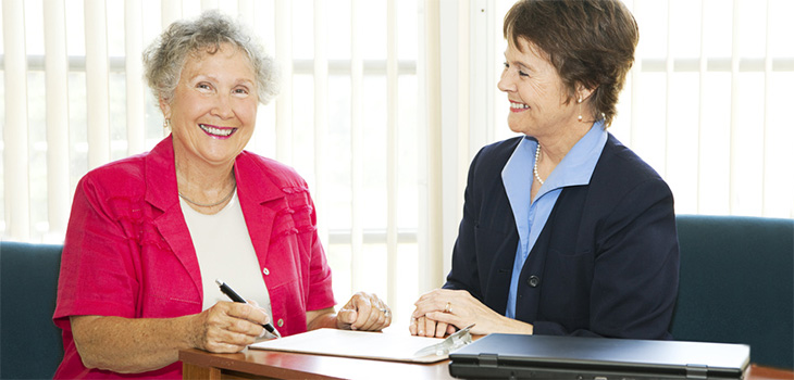 new resident signing paperwork for admission