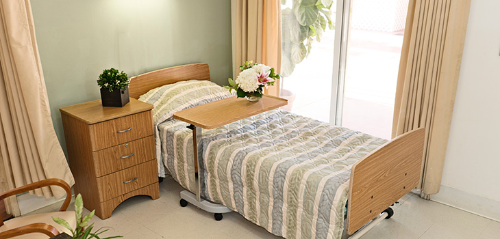 Resident room with a beautiful bouquet of flowers on the food tray