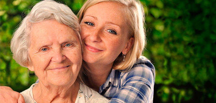 Two women smiling together