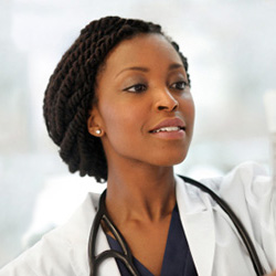 female medical professional administering an IV