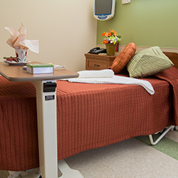 Resident room with nicely made bed
