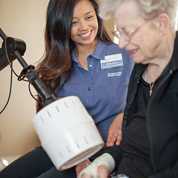 resident using therapy equipment